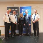 Michelle, from the Unitec team, with members of the Gardaí at the Fraud & Cyber Crime Prevention Seminar in February 2020