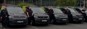 Unitec IT Solutions team of service engineers with vans